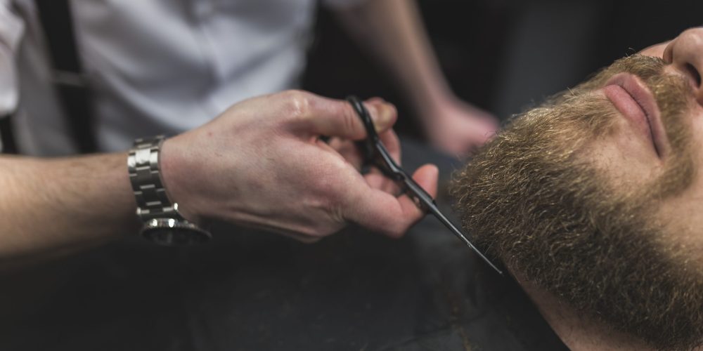 barber-cutting-beard-crop-client